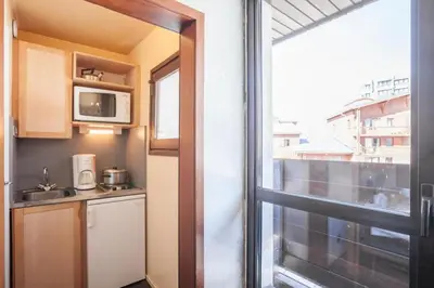 Cuisine ou kitchenette dans l'établissement ALAIN
