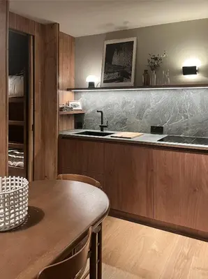 Cuisine ou kitchenette dans l'établissement Les Barmettes Appart rénové avec vue, parking et skis aux pieds