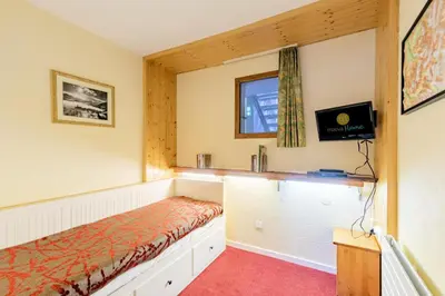 Télévision ou salle de divertissement dans l'établissement Résidences quartier Charmettoger - maeva Home - Appartement 2 pièces 5 personnes - Sélection MAE-6324