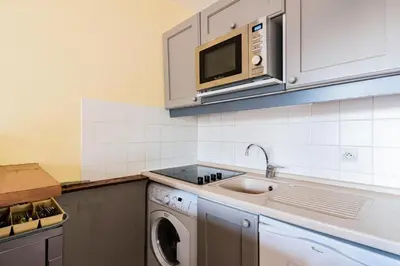 Cuisine ou kitchenette dans l'établissement Résidences quartier Charmettoger - maeva Home - Appartement 2 pièces 5 personnes - Sélection MAE-6324