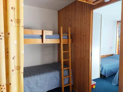Un ou plusieurs lits dans un hébergement de l'établissement Résidence Nova - Appartement 2 pièces 6 personnes proche des pistes, des commerces, de la garderie et de l'ESF au centre de la station d’Arc 1800 MAE-6744