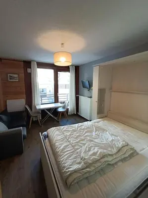 Un ou plusieurs lits dans un hébergement de l'établissement STUDIO 2 PERS PLEIN CENTRE VAL CLARET
