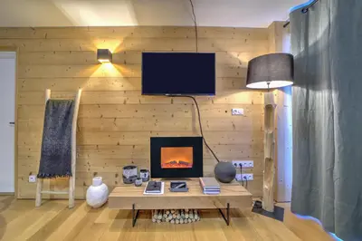 Télévision ou salle de divertissement dans l'établissement MyHome - Le Kachassa - Schuss Bel appartement 4 pax Tignes Val Claret
