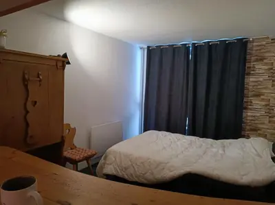 Un ou plusieurs lits dans un hébergement de l'établissement Studio pied des pistes Arcs 2000 - Résidence le Varet