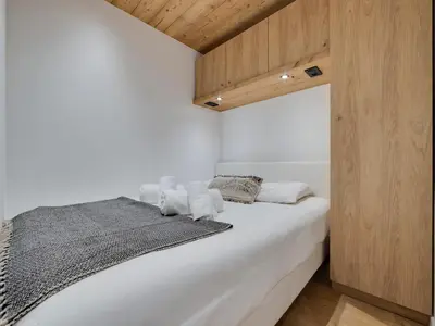 Un ou plusieurs lits dans un hébergement de l'établissement Appartement refait à neuf pour 4 personnes à Tignes Le Lac - FR-1-641-17