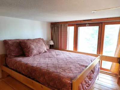 Un ou plusieurs lits dans un hébergement de l'établissement Résidence Mirantin 3 - Appartement 2 pièces, en duplex, pour 4 personnes, au pied des pistes et du télécabine et proche des commerces dans le village d MAE-1808