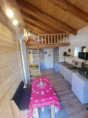 Cuisine ou kitchenette dans l'établissement Au petit bonheur à Val-Cenis