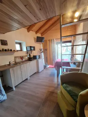 Cuisine ou kitchenette dans l'établissement Au petit bonheur à Val-Cenis