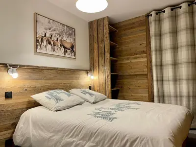 Un ou plusieurs lits dans un hébergement de l'établissement MyHome - Chamallow - appart 4-6 places rénové - cosy et confort !