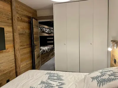 Un ou plusieurs lits dans un hébergement de l'établissement MyHome - Chamallow - appart 4-6 places rénové - cosy et confort !