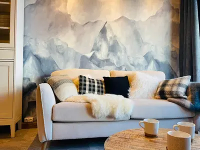 Coin salon dans l'établissement MyHome - Chamallow - appart 4-6 places rénové - cosy et confort !