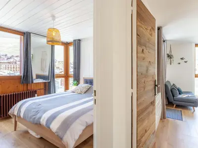 Un ou plusieurs lits dans un hébergement de l'établissement Apartment Savoy - Lavachet by Interhome