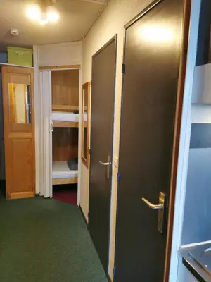 Un ou plusieurs lits dans un hébergement de l'établissement MyHome - Plein Soleil 36 - Studio cabine 4 pax ski in&out