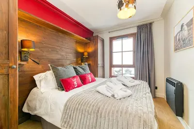 Un ou plusieurs lits dans un hébergement de l'établissement Penthouse-Chalet in Arc 1950 SKI IN-SKI OUT