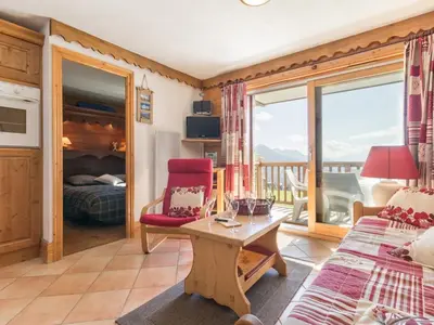 Un ou plusieurs lits dans un hébergement de l'établissement Chalet 3 pièces avec balcon, parking inclus, 6 pers. - FR-1-346-544