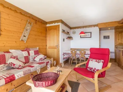 Coin salon dans l'établissement Chalet 3 pièces avec balcon, parking inclus, 6 pers. - FR-1-346-544
