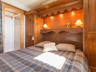 Un ou plusieurs lits dans un hébergement de l'établissement Chalet 3 pièces avec balcon, parking inclus, 6 pers. - FR-1-346-544