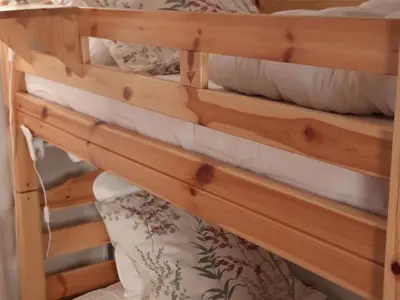 Un ou plusieurs lits dans un hébergement de l'établissement Chalet 3 pièces avec balcon, parking inclus, 6 pers. - FR-1-346-544