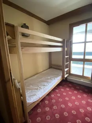 Un ou plusieurs lits dans un hébergement de l'établissement Résidence Les Arcs 1950 Le Village - maeva Home - Appartement 3 pièces 6 personnes - Confort MAE-5624