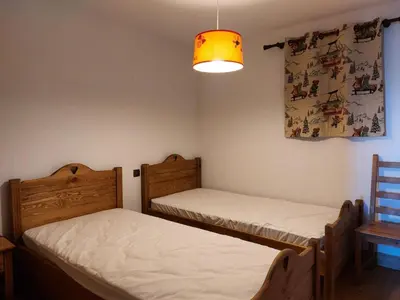 Un ou plusieurs lits dans un hébergement de l'établissement Résidence L'iseran - Charmant appartement de 4 pièces dans une résidence proche des pistes dans le quartier du Chantel. MAE-3184