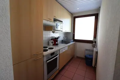 Cuisine ou kitchenette dans l'établissement Résidence Bec Rouge - Appartement lumineux·Pieds des pistes·WIFI·Balcon MAE-2694