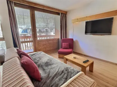 Télévision ou salle de divertissement dans l'établissement Grand studio mezzanine avec parking couvert, proche des pistes - FR-1-411-868
