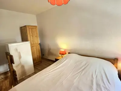 Un ou plusieurs lits dans un hébergement de l'établissement Résidence Hameaux De Val - Votre grand studio mezzanine avec garage couvert à 5 min des pistes MAE-1004