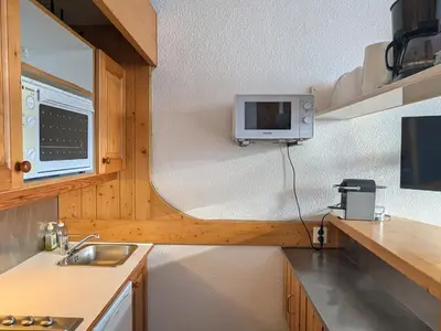 Cuisine ou kitchenette dans l'établissement Studio confortable au pied des pistes avec balcon - FR-1-346-546