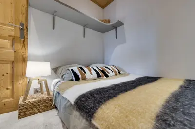 Un ou plusieurs lits dans un hébergement de l'établissement L'Aigle du Laisinant duplex de 90m2 à Val d'Isere