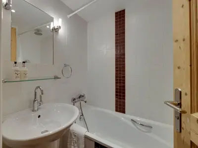 Salle de bains dans l'établissement Le Loup du Laisinant