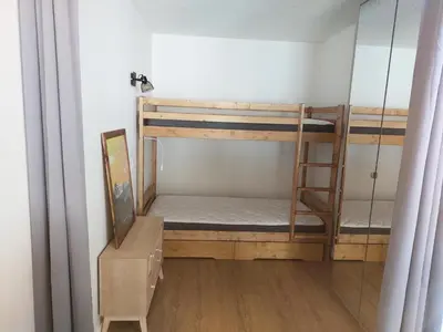 Un ou plusieurs lits superposés dans un hébergement de l'établissement Résidence Beryl - Studio divisible renové · Coeur de station · Vue pistes · Parking offert MAE-5114