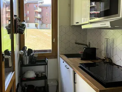 Cuisine ou kitchenette dans l'établissement Résidence Beryl - Studio divisible renové · Coeur de station · Vue pistes · Parking offert MAE-5114