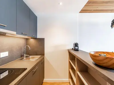 Cuisine ou kitchenette dans l'établissement Apartment Le Curling A - Val Claret-23 by Interhome