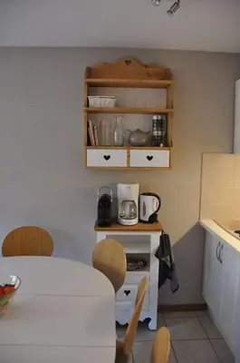 Cuisine ou kitchenette dans l'établissement Appartement cosy Peisey Les Arcs 6-8 pers - piscine sauna - en face des pistes