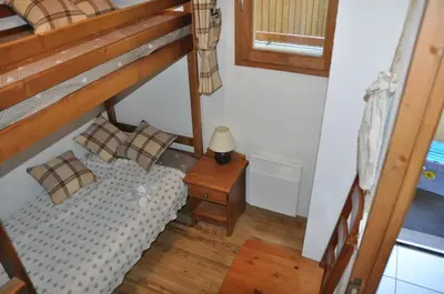 Un ou plusieurs lits dans un hébergement de l'établissement Appartement cosy Peisey Les Arcs 6-8 pers - piscine sauna - en face des pistes