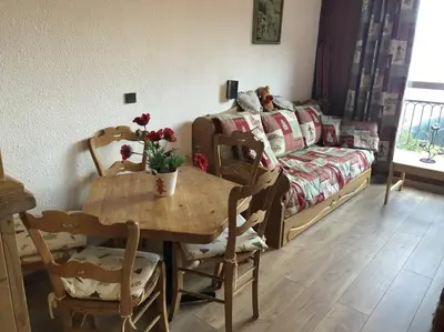 Coin salon dans l'établissement Appartement Zen