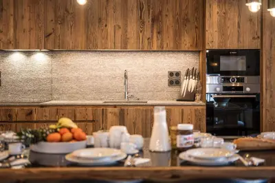 Cuisine ou kitchenette dans l'établissement Madame Vacances Chalet Atacama