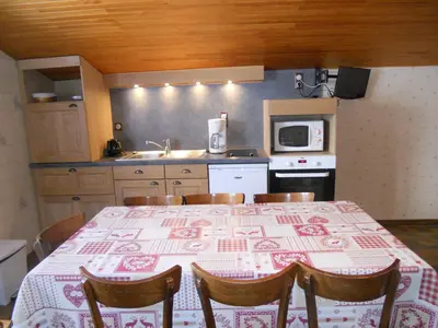 Cuisine ou kitchenette dans l'établissement Le Sablon