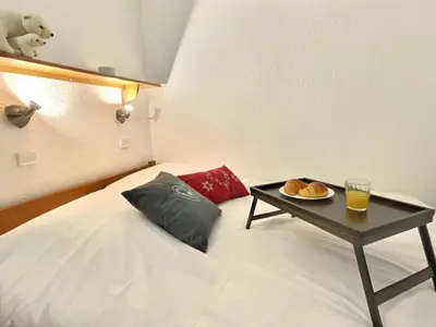 Un ou plusieurs lits dans un hébergement de l'établissement Appartement 2 pièces, 4 pers, proche centre et pistes, animaux admis - FR-1-411-173