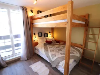 Un ou plusieurs lits dans un hébergement de l'établissement Appartement spacieux 6 pers · Ski aux pieds · Balcon Sud · Wifi - FR-1-502-473