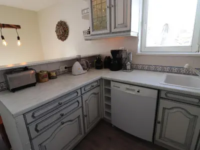 Cuisine ou kitchenette dans l'établissement Appartement spacieux 6 pers · Ski aux pieds · Balcon Sud · Wifi - FR-1-502-473
