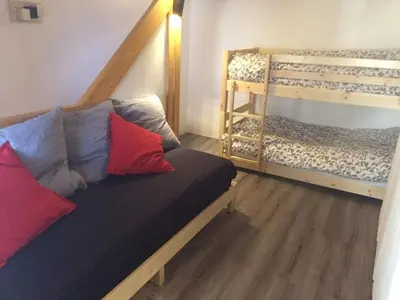 Un ou plusieurs lits dans un hébergement de l'établissement Arcs 1800 Duplex rénové 5 pers au pied des pistes calme location à la semaine seulement