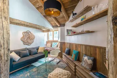 Coin salon dans l'établissement Top floor appartment, ski in ski out, superb view