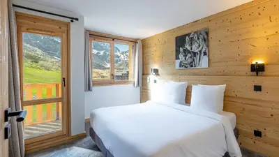 Un ou plusieurs lits dans un hébergement de l'établissement Résidence W 2050 - BELLE PLAGNE