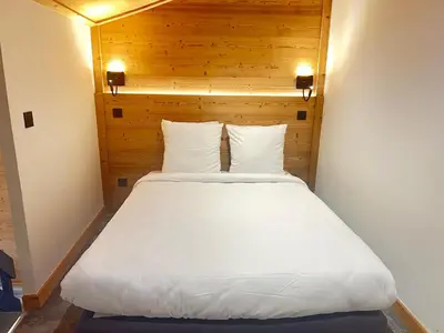 Un ou plusieurs lits dans un hébergement de l'établissement Résidence W 2050 - BELLE PLAGNE