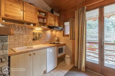 Cuisine ou kitchenette dans l'établissement AGNELIE 4