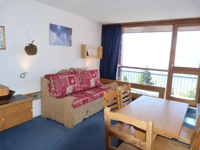 Coin salon dans l'établissement Résidence Bequi-rouge - Appartement 2 pièces 5 personnes, avec une belle vue sur la vallée, au cœur de la station d’Arc 1800 dans le village des Villard MAE-1734