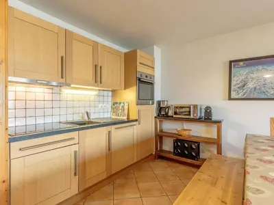 Cuisine ou kitchenette dans l'établissement Appart 4P au pied des pistes avec WIFI et parking - FR-1-352-81