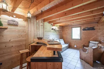 Coin salon dans l'établissement Chalet le Grand Bec