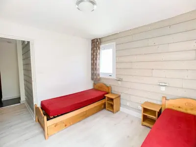 Coin salon dans l'établissement Confort, 3 pièces rénové, près des pistes, 9 pers, balcon à Tignes - FR-1-502-477